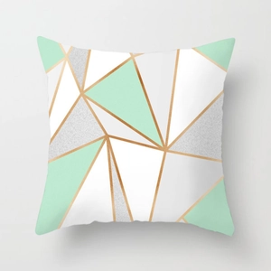 Detail of mint green geometric pillowcase with gold lines in Nordic minimalist style