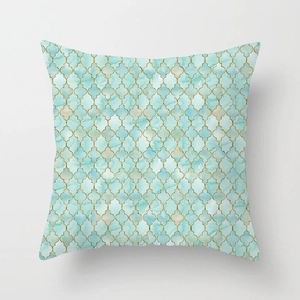Mint green geometric throw pillow cover with golden Moroccan pattern on white background