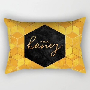 Fodera per cuscino gialla moderna con motivi geometrici e scritta HELLO honey