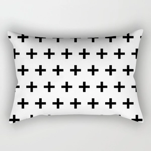 Modern black and white geometric plus pattern rectangle throw pillow cover on grey background