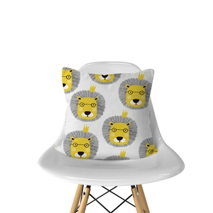 Detail of Nordic cartoon lion print cushion cover on a modern white chair