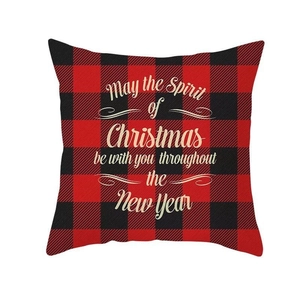 Classic red buffalo plaid Christmas pillow cover with festive greeting text on white background