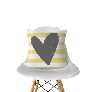 Detail of Nordic striped cushion cover with grey heart on a white designer chair