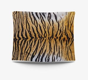 Detailed view of realistic orange and black tiger print fabric texture for home decor