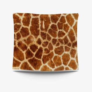 Detailed view of square cushion cover with realistic brown giraffe animal fur print