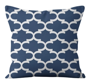 Close-up of square linen pillowcase with deep blue and white geometric chain patterns