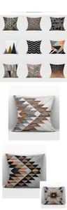 Detail of grey geometric cushion cover showing modern patterns and textured fabric surface