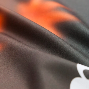Macro view of Christmas pillow cover fabric showing fine texture and digital gradient print