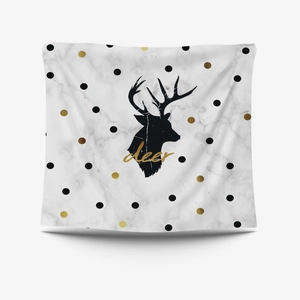 Close-up of pink deer tapestry with golden dots on marble texture background