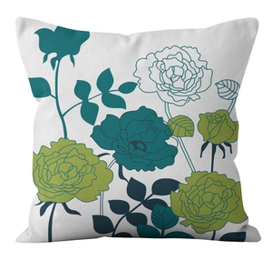 Detailed view of linen pillow cover with blue floral pattern on white background