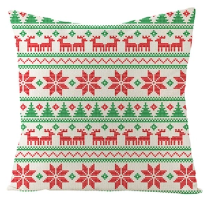 Detail of Christmas reindeer and snowflake pattern on beige linen cushion cover