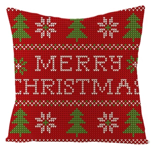 Close-up of red linen Christmas pillow cover with snowflake and tree knitting texture