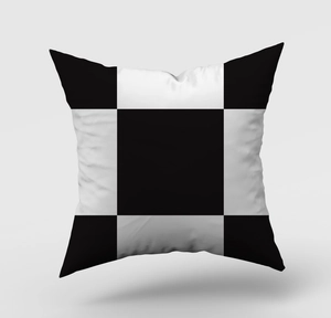 Detail of modern black and white geometric cushion cover with soft textured fabric