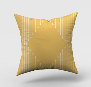 Close-up of ginger yellow square cushion cover with white geometric diamond patterns