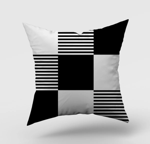 Detail of modern black and white geometric cushion cover with striped fabric texture