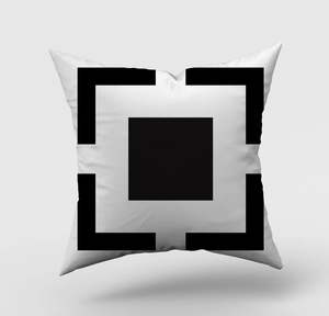 Detail view of modern black and white geometric square pillowcase with premium fabric texture