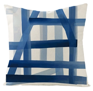 Close-up of blue geometric linen pillow cover showing high-quality fabric texture