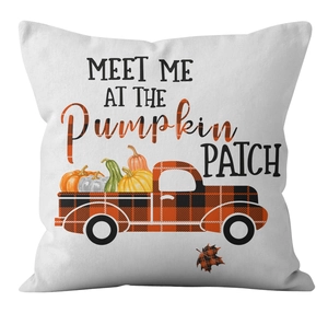 Detail of white pillow case with vintage pumpkin truck and harvest theme design