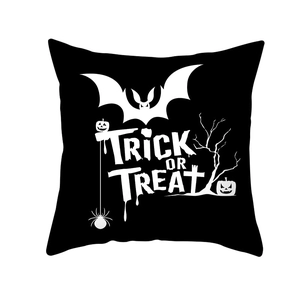 Halloween throw pillow cover featuring bats, pumpkins and Trick or Treat text on black background
