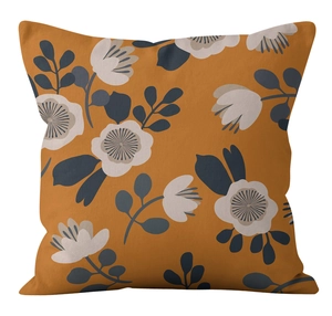 Detail of modern mustard yellow pillowcase featuring retro floral print and fabric texture