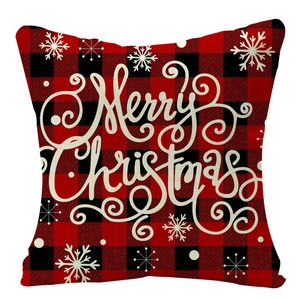 Detail of red and black buffalo plaid linen pillowcase with Merry Christmas text