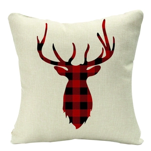 Christmas plaid linen pillow cover with red buffalo plaid deer head silhouette on beige fabric