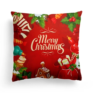 Detail of red Christmas pillowcase featuring festive hand-drawn Merry Christmas patterns