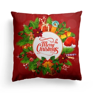 Detail of red Christmas pillowcase featuring a Merry Christmas wreath and festive icons