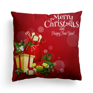 Close-up of red Christmas pillow case featuring Santa sack and holiday gift box patterns