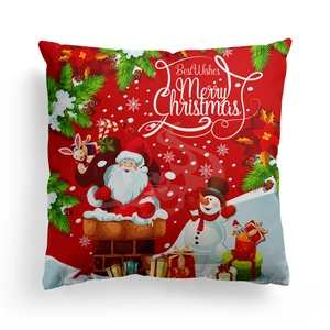 Detailed view of red Christmas pillowcase with Santa Claus and snowman festive patterns