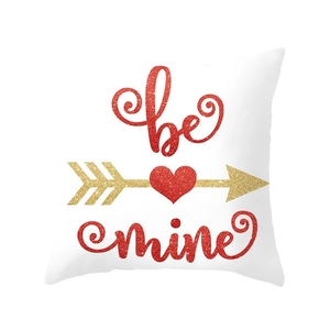 Valentine's Day red heart cushion cover with be mine text and gold arrow on white fabric