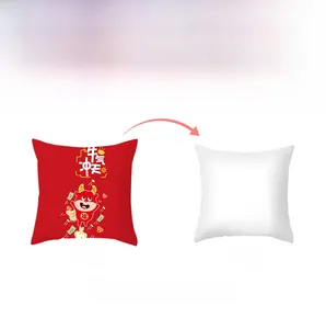 Detail showing the red front with cartoon ox and pure white back of the pillowcase