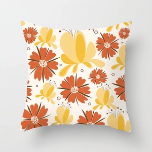 Detailed view of the square pillow cover with vintage orange floral and butterfly patterns