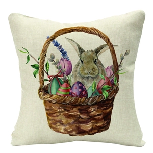 Easter linen pillow cover with watercolor bunny and colorful eggs in a basket design