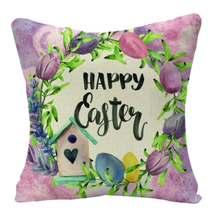 Close-up of Happy Easter linen pillowcase with watercolor flowers and birdhouse detail
