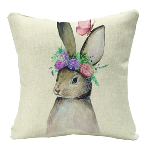 Detail of linen Easter pillowcase featuring a watercolor bunny and floral wreath print