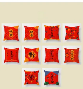 Collection of ten festive red Chinese New Year cushion covers with traditional patterns