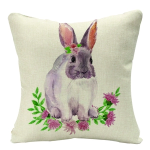 Macro texture of linen Easter pillow cover with watercolor bunny and floral pattern