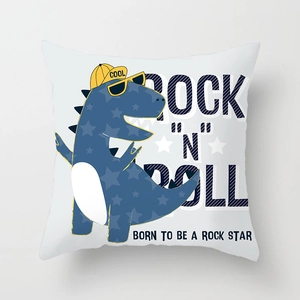 Detail eines Kissenbezugs mit Cartoon-Dinosaurier, Rock 'N' Roll-Print und Sonnenbrille