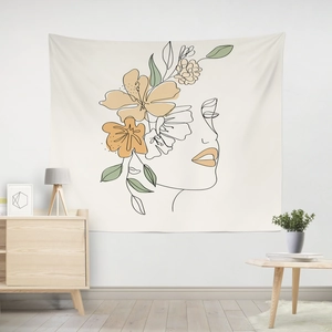 Detail of Morandi abstract wall tapestry showing minimalist face line art and floral patterns