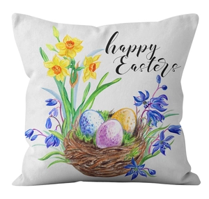 Macro detail of Easter pillow cover with watercolor flower wreath and colorful eggs print