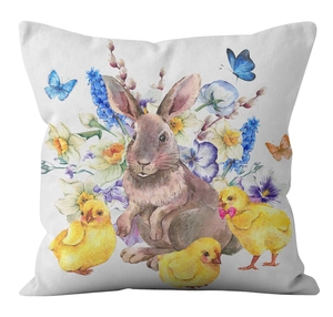 Close-up of Easter pillow case with watercolor bunny, chicks and spring floral print