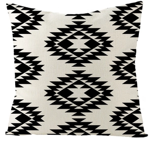 Macro detail of geometric Moroccan patterns on off-white linen texture pillowcase