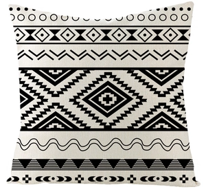 Detail of bohemian black and white geometric pattern on cotton linen pillow cover