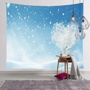 Detail of a winter snowy scene tapestry featuring a heart-shaped snow tree on a brick wall