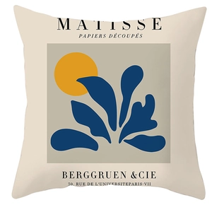 Detailed close-up of Matisse style cushion cover with blue leaves and yellow sun print