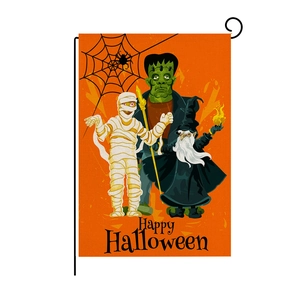 Detail of Halloween garden flag with Frankenstein and Mummy on orange linen fabric
