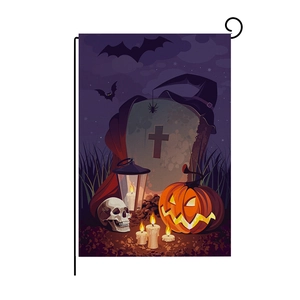 Halloween garden flag with skull, pumpkins, and bats on a black metal stand hanger