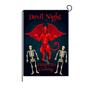 Macro view of Devil Night linen garden flag with skull prints and metal display stand