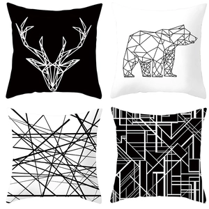 Set of four minimalist black and white geometric throw pillow covers with animal patterns